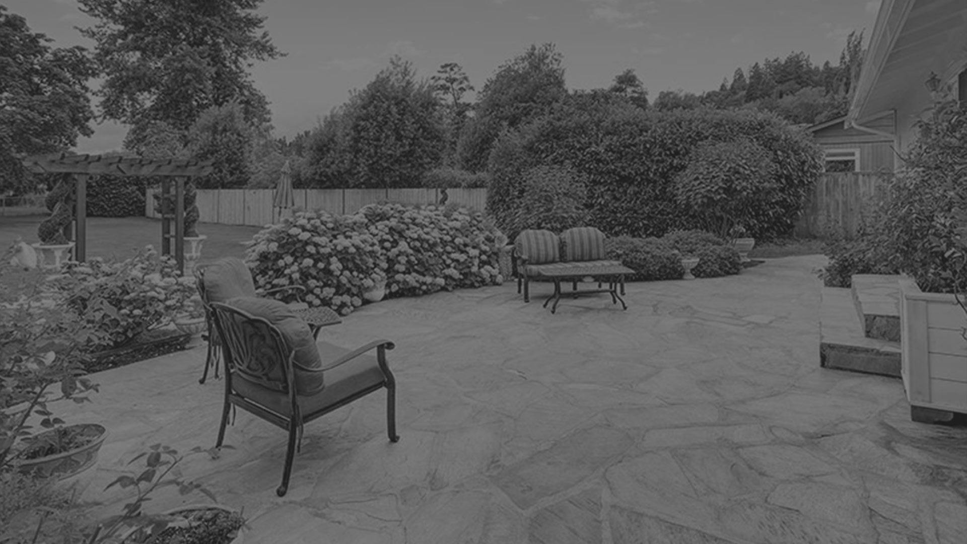 decorative-concrete-patio-and-landscaping-in-backyard-laurens-sc)